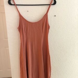 Light orange mini dress.